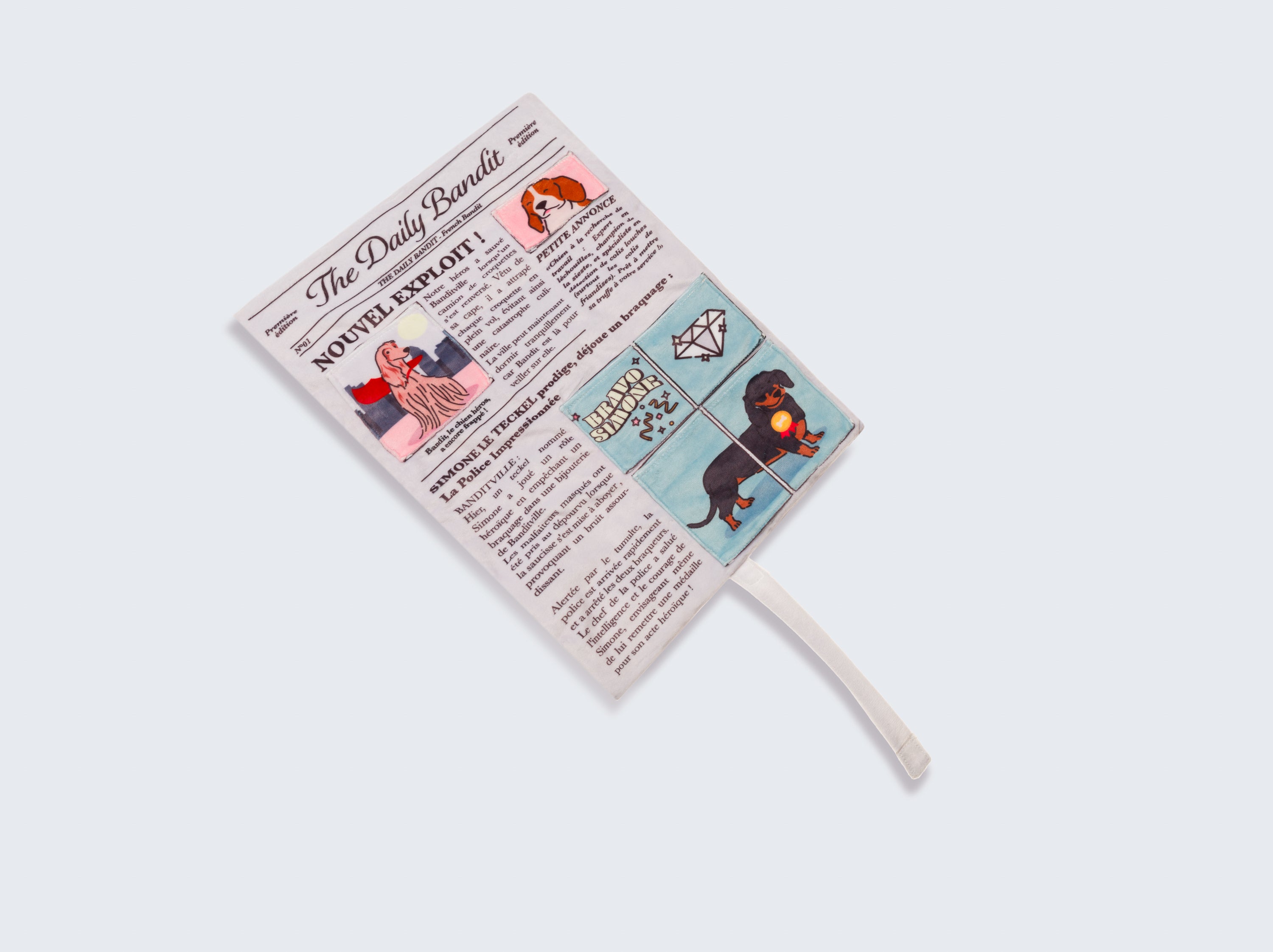 Jouet pour chien en forme journal